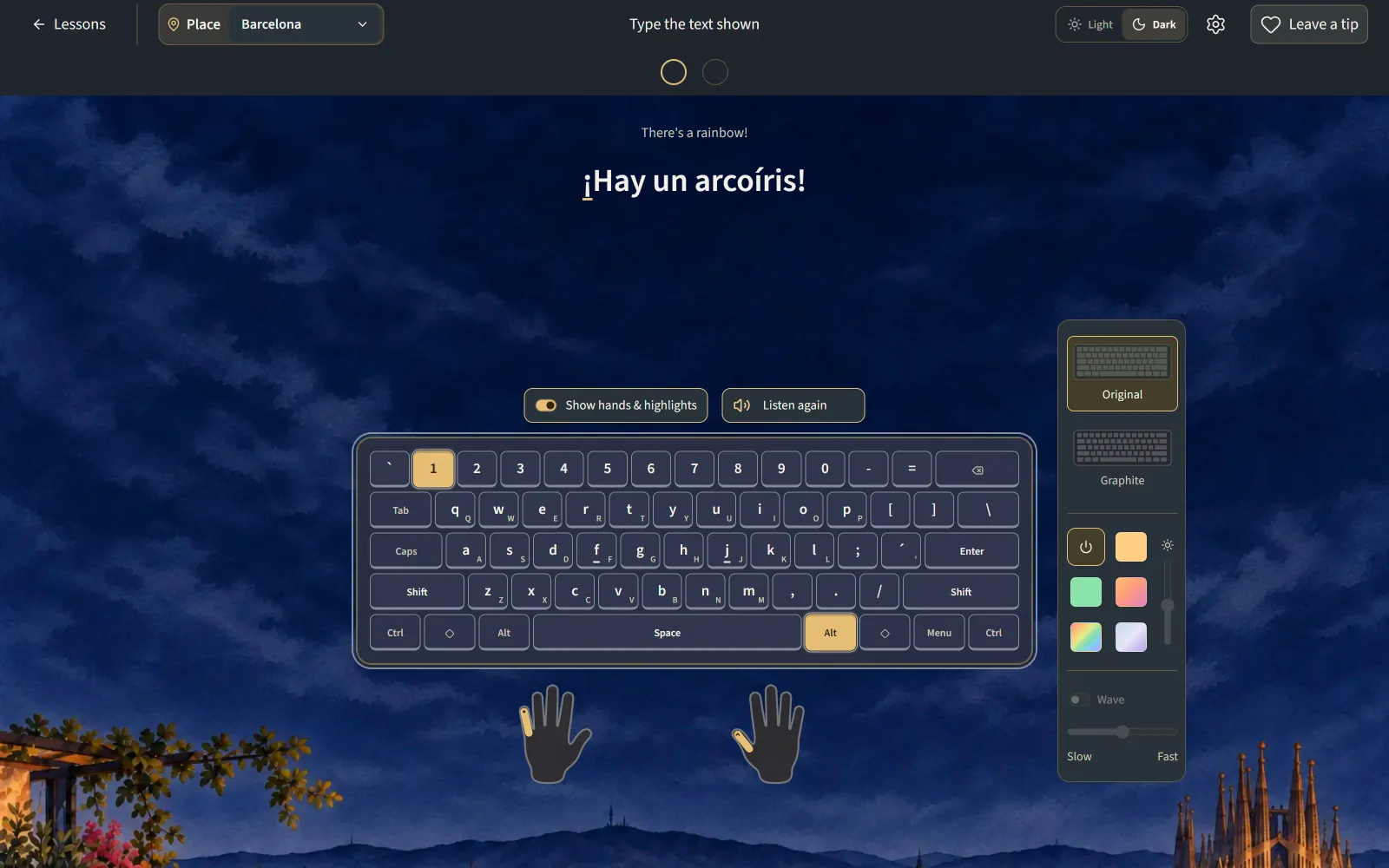 A Spanish lesson at night over Barcelona, typing the sentence There is a rainbow, with the dark theme on.