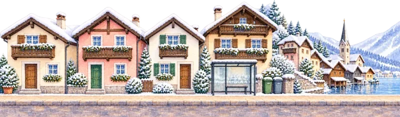 The street in Hallstatt, with clustered lakeside houses with pale plaster façades and dark timber balconies beneath snowy wooded slopes