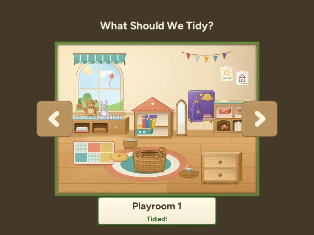The Their First Tidy room picker, asking &ldquo;What Should We Tidy?&rdquo; — the Playroom 1 card sits in a green frame with &ldquo;Tidied!&rdquo; under it